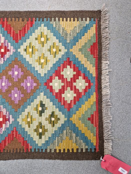 Blue ground Maimana kilim runner with one central row of nine lozenge floral medallions flanked by - Image 2 of 8