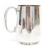 Victorian tapering cylindrical silver mug, engraved with the conjoined initials HM/HL, the