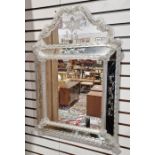 Venetian glass wall mirror with swan-neck arched top, rectangular frame and having spirally