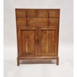20th century oak cabinet having two short over one long drawer, over a further two-door cupboard,
