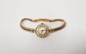 9ct gold wristwatch with 9ct gold herringbone-pattern flexible mesh strap, button winding, gross