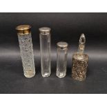 Victorian silver-mounted cut-glass perfume bottle and stopper and two silver-topped cut-glass jars