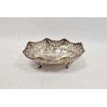 George V silver footed oval bowl, with shaped rim pierced with interlocking scrolls and ovolos,