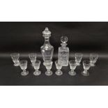Waterford cut glass decanter and stopper, a further decanter and assorted drinking glasses, the