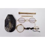 Pair of gold coloured metal spectacles, pair gold plated folding lorgnettes, two gold plated