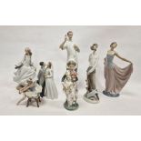 Seven Lladro figures, printed and impressed marks, including: a dentist, a group of bride and groom,