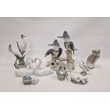 Group of eight Lladro and Nao figures, printed and impressed marks, including: a pair of swans in