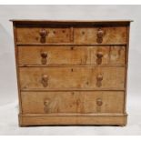 Late Victorian pine chest of drawers with two short drawers above three long graduating drawers,