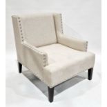 Modern armchair with chrome button decoration to the arms and back, 88cm high