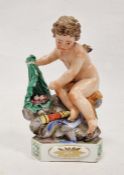 Meissen (Marcolini) figure of Cupid atop rockwork, circa 1800, blue crossed swords, star and I mark,