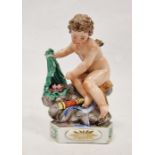 Meissen (Marcolini) figure of Cupid atop rockwork, circa 1800, blue crossed swords, star and I mark,