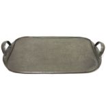 Tudric for Libertys hammered pewter two-handled tray, rounded oblong with pair end loop handles,