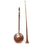 Long copper and brass hunting horn, trumpet-shaped, 123cm high and a copper warming pan with