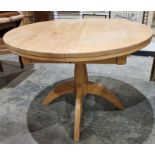 Lightwood circular pedestal dining table, 106cm wide