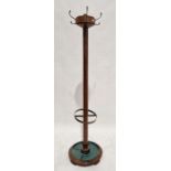 Early 20th century oak coat and umbrella stick stand of cylindrical form, 185cm high together with