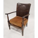 20th century leather-back armchair with masted ship motif to the back, on turned front legs, 78cm