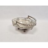 Victorian pierced shaped octagonal bread basket, with pierced husk swing handle and ovolo gallery,