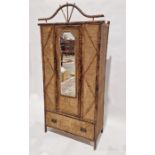 Late 19th/early 20th century bamboo and wicker single door wardrobe, the door fronted with