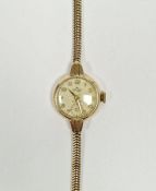 Vintage lady's 9ct gold Smith's deluxe wristwatch, the circular dial with gilt Arabic numerals