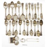 Assortment of silver plated flatware to include table forks, spoons, sugar tongs, butter knives, etc