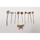Collection of gold coloured metal and gilt stick pins to include lapis set, seed pearl and others