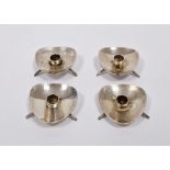 Set of four mid century Danish silver-plated candle holders, each raised on three feet, 2cm high (4)