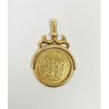 George III gold guinea 1786 in Victorian 18ct gold swivel pendant with scroll surmount hallmarked