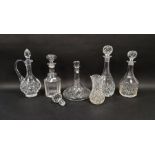 Assorted cut glass decanters, claret jugs and other items including a ships decanter, a claret