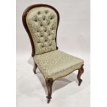 Victorian mahogany button-back nursing chair with upholstered seat and back on original metal