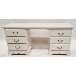 White painted pine desk, each pedestal having three short drawers with metal handles, raised on