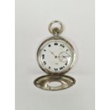 Silver cased half hunter pocket watch, the enamel dial having Roman numerals denoting hours, seconds