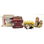 Pelham puppet 'Cat', in original box, a toy accordion and a Russian matryoshka doll (3)