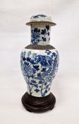 19th century Chinese blue and white crackle glazed baluster vase and cover, on hardwood stand,