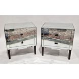 Pair of mirrored bedside chests of drawers, each having two drawers, on tapered legs, 64cm high x