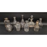 Group of nine decanters and carafes, early 19th century and later, including: a notch cut carafe,