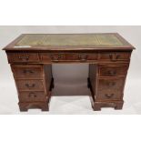 Twin pedestal oak veneer desk with gilt tooled leather top, 77cm high x 124cm wide x 60cm deep