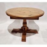 Pine circular pedestal dining table on quadruple supports, 109cm wide