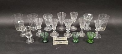 Assorted glassware, including: two cut glass jelly glasses, four star etched beakers, seven panel