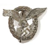 German cast metal badge in the form of a Second World War luftwaffe pilots badge, unmarked