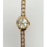 Lady's 9ct gold Corvette manual wind wristwatch, the silvered dial with raised gilt baton hour