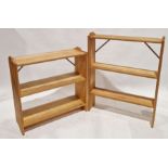 Two modern pine bookshelves, the largest measuring 103cm high x 82cm wide x 20cm deep approx.