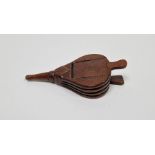 19th century treen snuff box in the form of a pair of bellows with brass tack decoration in