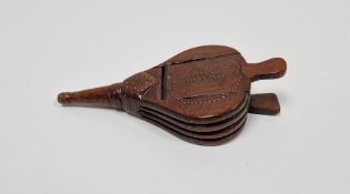 19th century treen snuff box in the form of a pair of bellows with brass tack decoration in