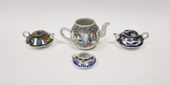 Two Japanese porcelain miniature teapots and covers, early 20th century, decorated landscapes or