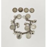 Silver curb link bracelet with threepenny bit and animal charms, and four silver 3d coins