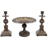 Late Victorian bronze garniture of three pieces, viz:- tazza with pierced everted rim and the top