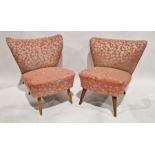Pair of pink upholstered chairs raised on turned tapered legs, 71cm high approx.
