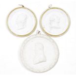 Three French biscuit porcelain portrait medallions, comprising: two Sevres (hardpaste) white and