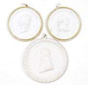 Three French biscuit porcelain portrait medallions, comprising: two Sevres (hardpaste) white and