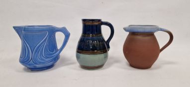 Lauder Barum Art Pottery jug, a Brannam Royal Barum Ware Art Nouveau blue-ground jug and a Baron